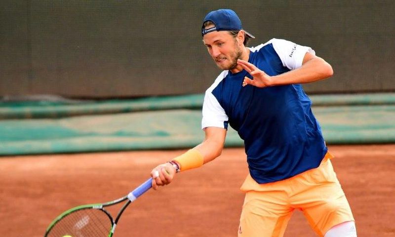 France's Lucas Pouille returns the ball to Britain's Aljaz Bedene during their final match at the Hungarian Open in Budapest, on April 30, 2017
