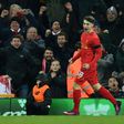 Liverpool's Welsh striker Ben Woodburn celebrates scoring a goal during the EFL Cup quarter-final match against Leeds United at Anfield in Liverpool on November 29, 2016
