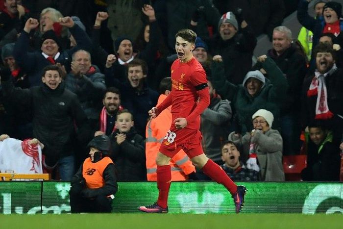 Liverpool's Welsh striker Ben Woodburn celebrates scoring a goal during the EFL Cup quarter-final match against Leeds United at Anfield in Liverpool on November 29, 2016