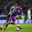 Real Madrid's forward Cristiano Ronaldo (R) clashes with Sporting's defender Ruben Semedo on November 22, 2016