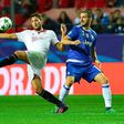 Sevilla's forward Franco Vazquez (L) clashes with Juventus' defender Leonardo Bonucci on November 22, 2016