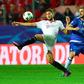 Sevilla's forward Franco Vazquez (L) clashes with Juventus' defender Leonardo Bonucci on November 22, 2016