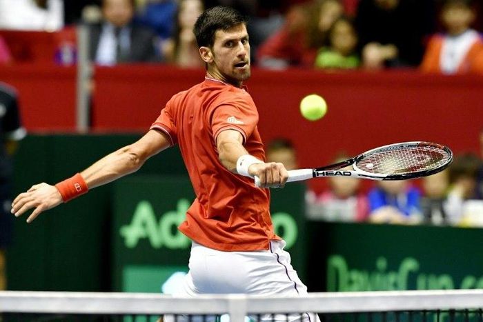 Serbia's Novak Djokovic returns the ball to Spain's Albert Ramos-Vinolas during their Davis Cup World Group quarter-finals singles match, in Belgrade, on April 7, 2017