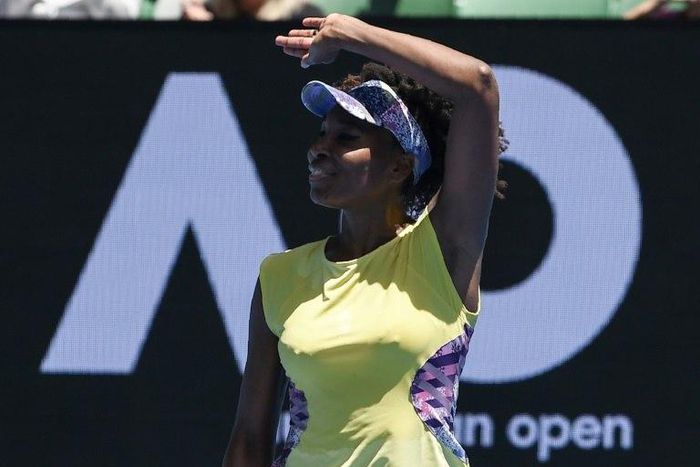 Venus Williams of the US celebrates after defeating Switzerland's Stefanie Voegele in their Australian Open second round match, in Melbourne, on January 18, 2017
