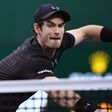 Andy Murray of Britain hits a return against Roberto Bautista Agut of Spain in their men's singles finals match at the Shanghai Masters on October 16, 2016