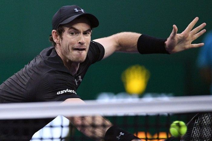 Andy Murray of Britain hits a return against Roberto Bautista Agut of Spain in their men's singles finals match at the Shanghai Masters on October 16, 2016