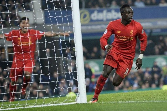 Liverpool's Senegalese midfielder Sadio Mane (R) says the squad is strong enough to make up for him playing at African football's showpiece tournament in Gabon