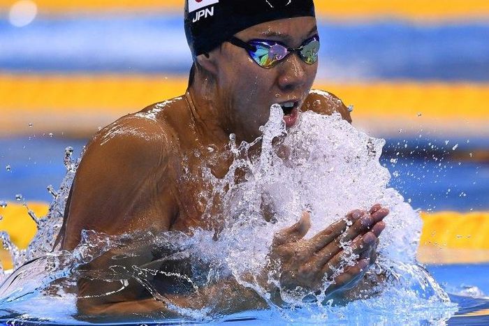 Japan's Ippei Watanabe competes in a 200m breaststroke heat during the Rio 2016 Olympic Games