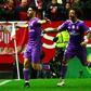 Real Madrid's midfielder Marco Asensio (L) celebrates with Real Madrid's Brazilian defender Marcelo after scoring against Sevilla during a Spanish Copa del Rey round of 16 match on January 12, 2017