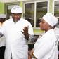 Dr. Spio-Garbrah with top management of Nestle Ghana