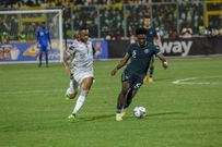 Ola Aina of Nigeria and Jordan Ayew of Ghana during the 2022 World Cup Qualifier between Ghana and Nigeria
