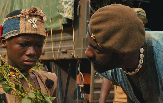 Abraham Attah (left) and Idris Elba in 'Beasts of No Nation'