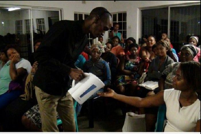 The pastor carrying out his kettle miracle