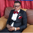 Bishop Obinim in suit