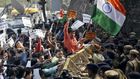 Fighting outside Indian court hearing student sedition case