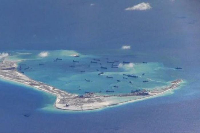 China defends South China Sea reef landings after Vietnam complaint