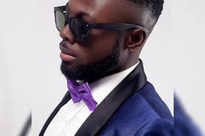 YujinSpeaks, real name Eugene Evans Arthur in blue suit