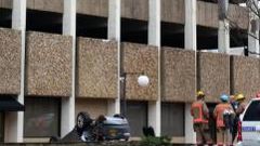 Woman survives car fall from a 4 storied building