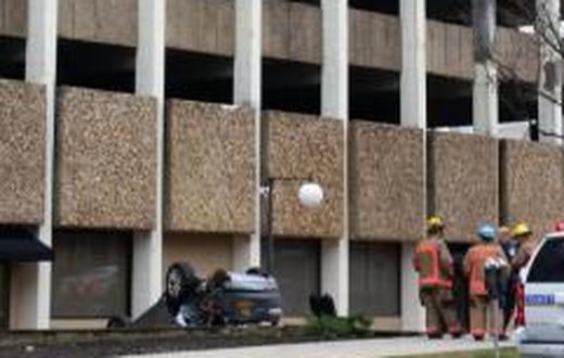 Woman survives car fall from a 4 storied building
