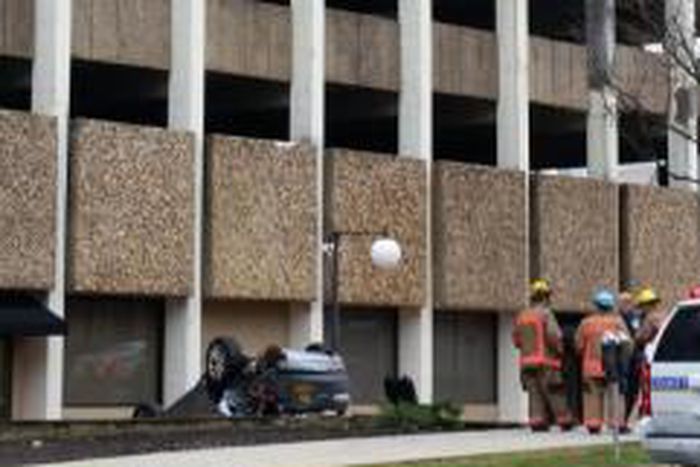 Woman survives car fall from a 4 storied building