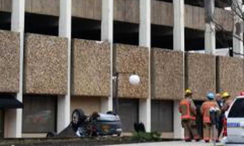 Woman survives car fall from a 4 storied building