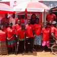 Some of the beneficiaries at the presentation with some dignitaries who graced the occasion in a group photograph as Airtel donated to the challenged