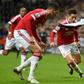 ___4554064___https:______static.pulse.com.gh___webservice___escenic___binary___4554064___2016___1___13___16___chris-smalling-gini-wijnaldum-cropped_eovhvnhvyqvk1gjzyvav42thj_1