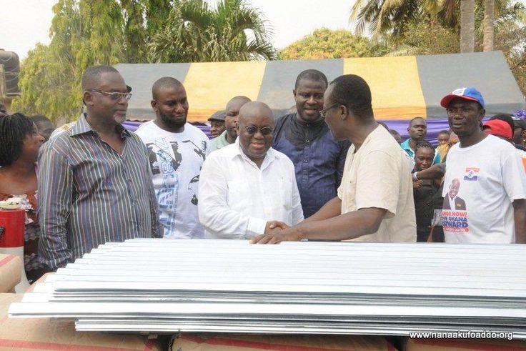 Akufo-Addo presenting the items