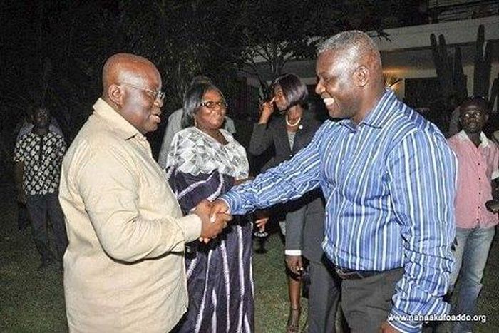 Adakabri F. Manso in a handshake with Nana Akufo-Addo and looking on is Elizabeth Ohene.