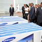 Acting President Emmerson Mnangagwa tours the SamZim plant, which assembles Samsung electronic gadgets, accompanied by the firm’s chairman Mr YC Baik and Director-General in the President’s Office Retired Major-General Happyton Bonyongwe in Harare