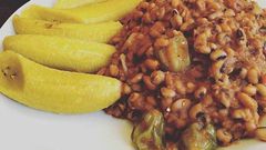 Beans stew and boiled ripe plantain