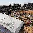 The remains of a Russian airliner are inspected by military investigators at the crashÂ site at the al-Hasanah area in El Arish city, north Egypt, November 1, 2015.  REUTERS/Mohamed Abd El Ghany