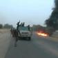 This screen grab image taken from a video released on January 2, 2018 by Islamist group Boko Haram shows Boko Haram fighters during a Christmas Day attack on a military checkpoint in Molai village on the outskirts of the northeast Nigerian city of Maid...