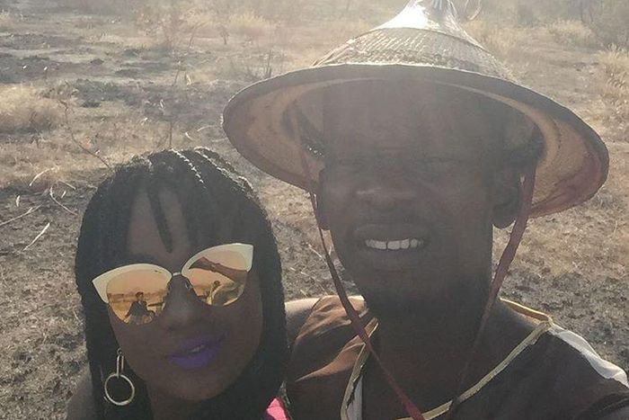 Mr Eazi and Efya take selfie behind the scenes of "Skin Tight" music video