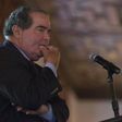 U.S. Supreme Court Justice Antonin Scalia listens to a question after speaking at an event sponsored by the Federalist Society at the New York Athletic Club in New York October 13, 2014.