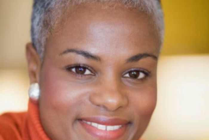 Black woman with short gray hair