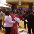 Guru donating 1000 books at a social gathering organized by The Ministry of Gender, Children and Social Protection at Moree in the central region of Ghana.
