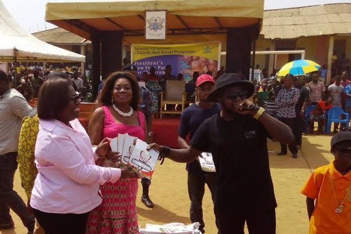 Guru donating 1000 books at a social gathering organized by The Ministry of Gender, Children and Social Protection at Moree in the central region of Ghana.