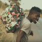 Shatta Wale walks on the street and shares his story in "Story To Tell" music video