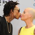Wiz Khalifa and Amber Rose share a kiss