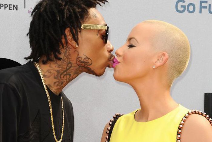 Wiz Khalifa and Amber Rose share a kiss