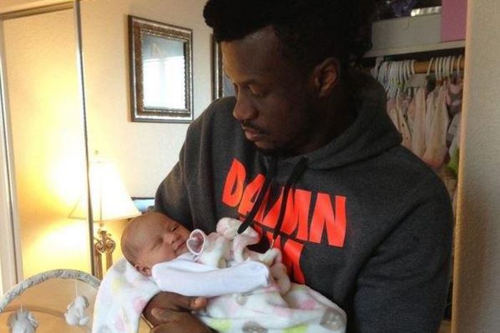 Peter Okoye holding his daughter Aliona three years ago
