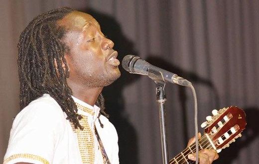 Wutah Afriyie behind the microphone