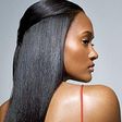 Black model showing off long hair