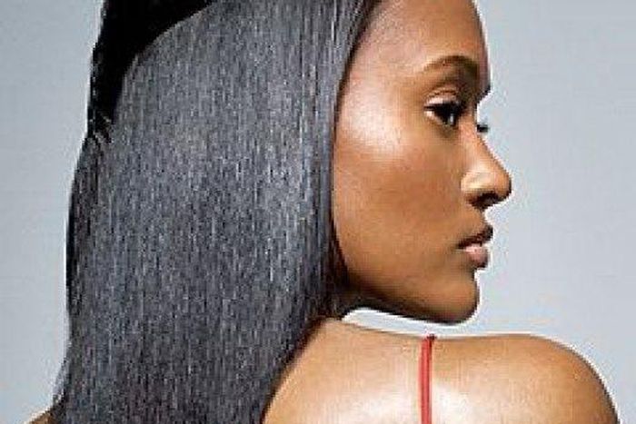 Black model showing off long hair