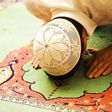 An Islam offering prayer to Allah
