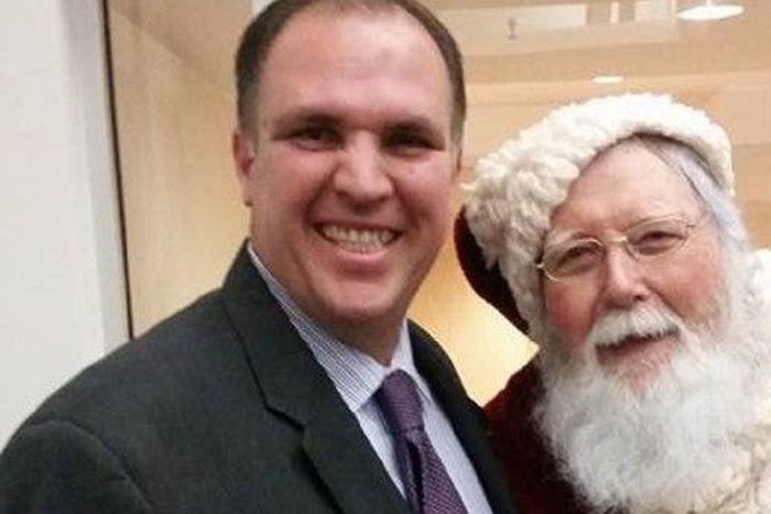 'Devout' Catholic Bill Metzger posing for a selfie with Santa