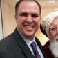 'Devout' Catholic Bill Metzger posing for a selfie with Santa