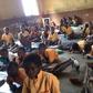 Pupils studying on the floor