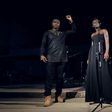 AJ Nelson and Wiyaala garbed in all black African prints performing in "Power To The People" music video